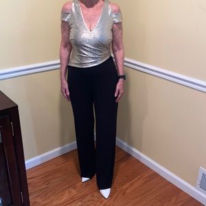 black and gold Venus Jumpsuit. size XS. NEVER WORN.